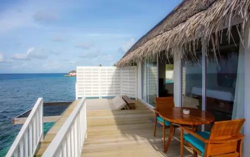 Centara Grand Island Maldives - Sunrise Overwater Villa Sitting Area Centara Grand Island Maldives - Sunrise Overwater Villa Sitting Area